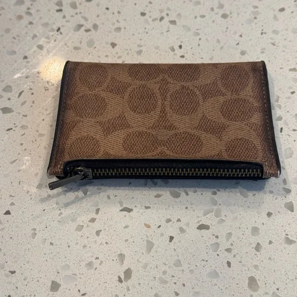 Coach Brown Laptop Bag with Monogram Pattern